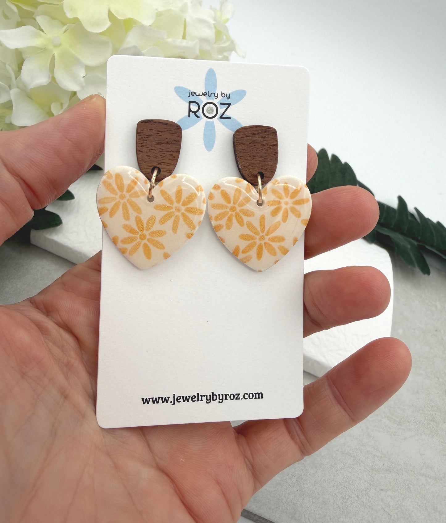 Earrings Made with White Polymer Clay Hearts with a Yellow Flower Pattern and Wood Posts PCE-1068