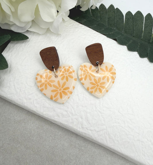 Earrings Made with White Polymer Clay Hearts with a Yellow Flower Pattern and Wood Posts PCE-1068