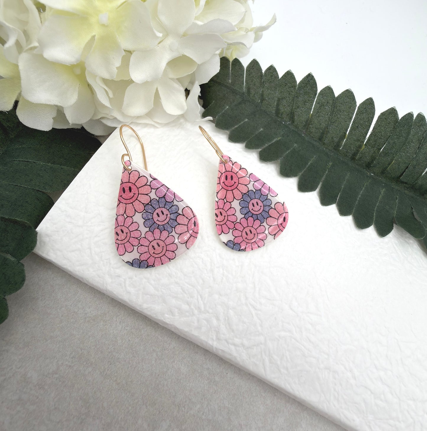 Earrings Made with White Polymer Clay Teardrops with a Smiley Face Flower Pattern PCE-1074