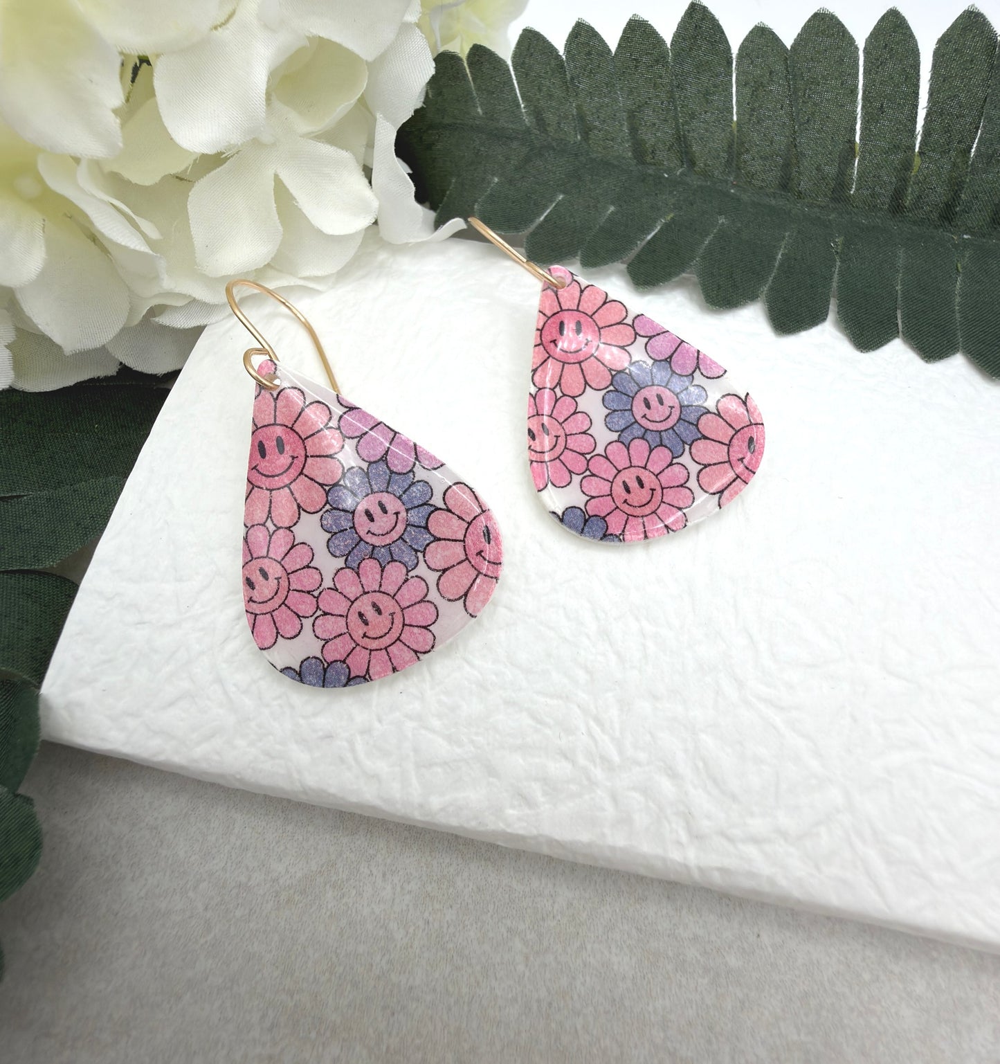 Earrings Made with White Polymer Clay Teardrops with a Smiley Face Flower Pattern PCE-1074