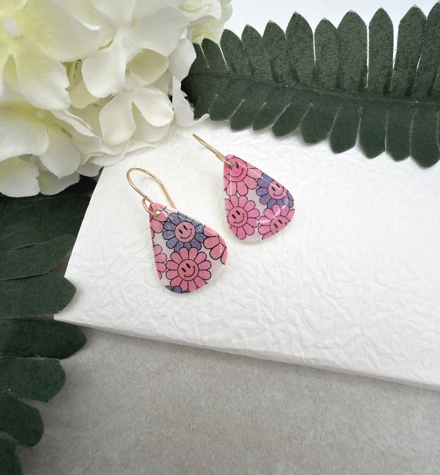 Earrings Made with White Polymer Clay Teardrops with a Smiley Face Flower Pattern PCE-1075