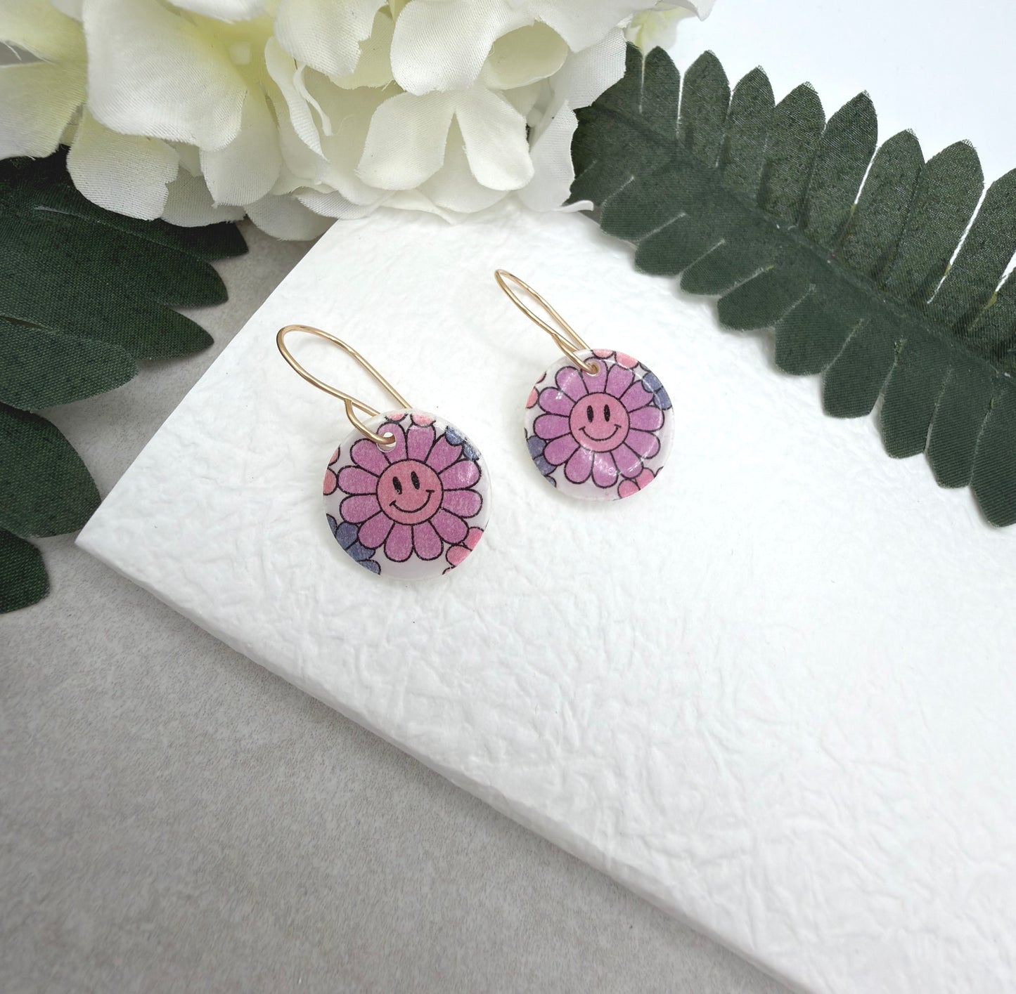 Earrings Made with White Polymer Clay Circles with a Smiley Face Flower Pattern PCE-1076