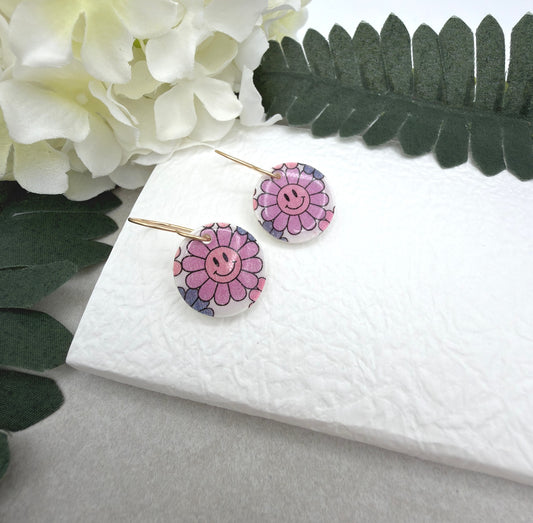 Earrings Made with White Polymer Clay Circles with a Smiley Face Flower Pattern PCE-1076