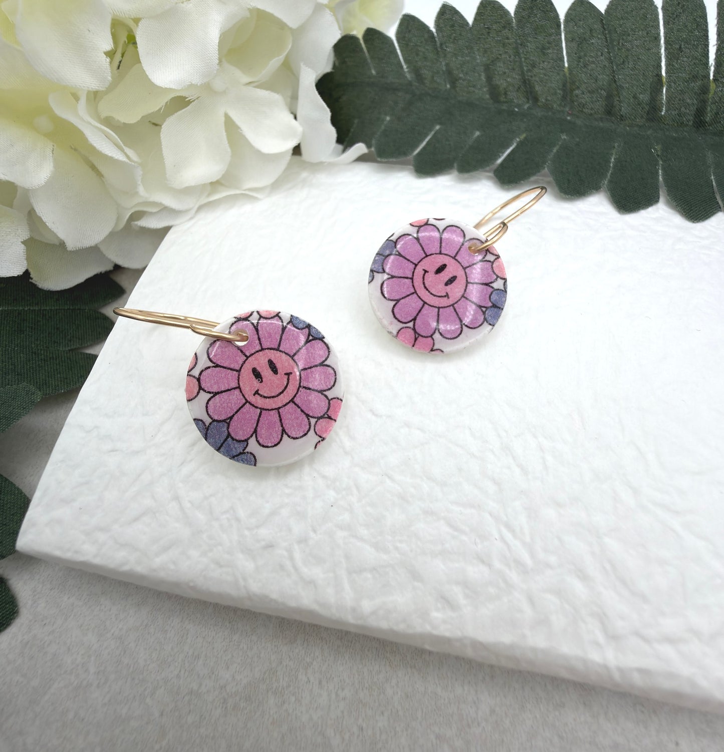 Earrings Made with White Polymer Clay Circles with a Smiley Face Flower Pattern PCE-1076