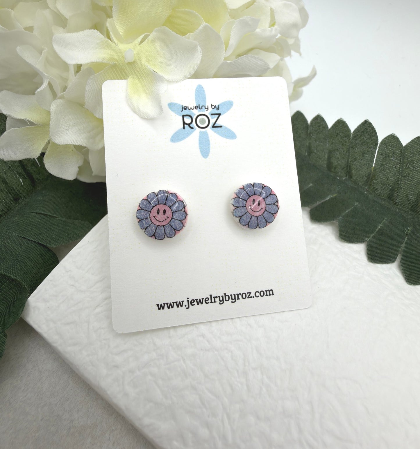Stud Earrings Made with White Polymer Clay with Blue Smiley Face Flowers and Sterling Silver Posts PCE-1077