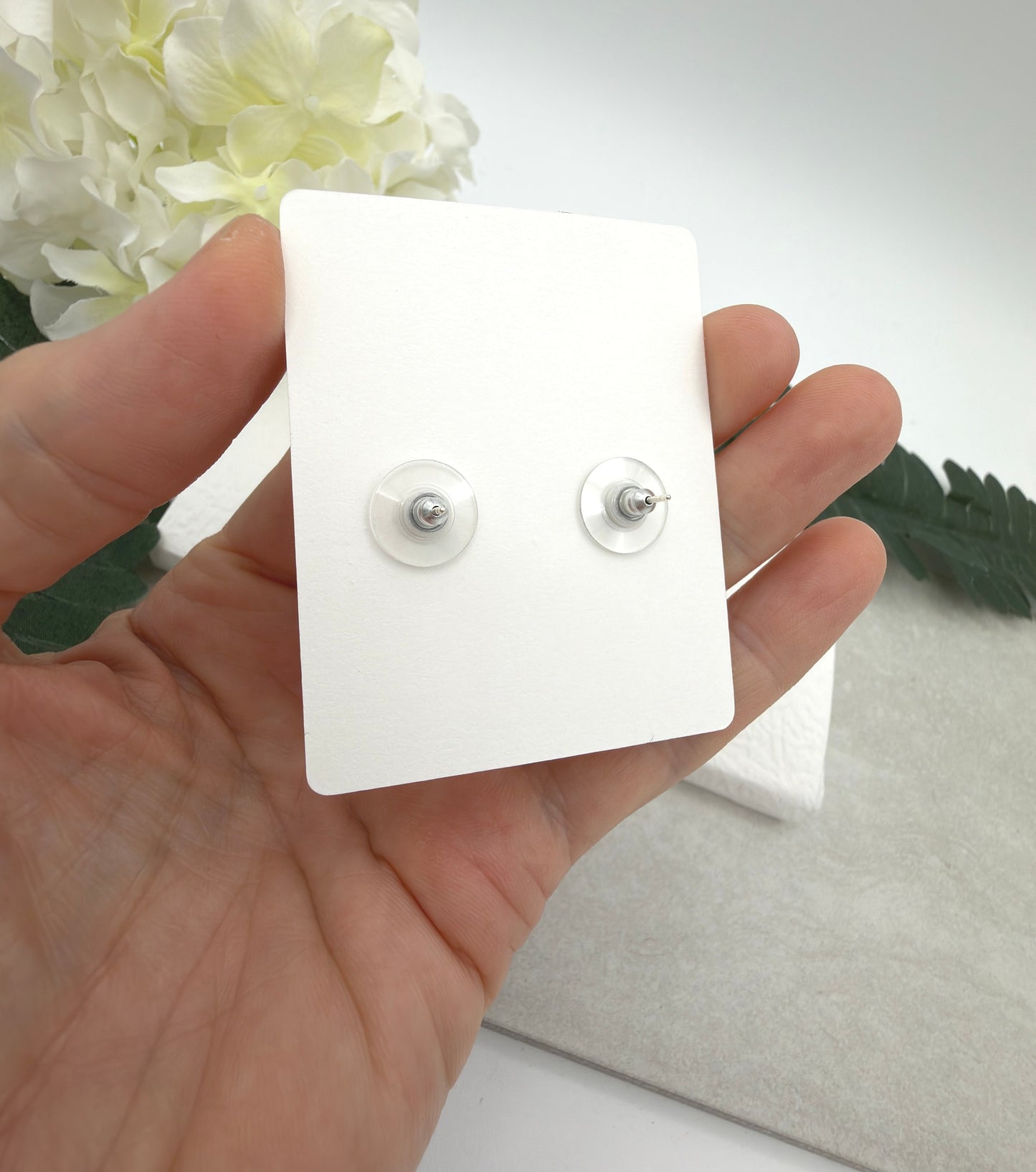 Stud Earrings Made with White Polymer Clay with Blue Smiley Face Flowers and Sterling Silver Posts PCE-1077