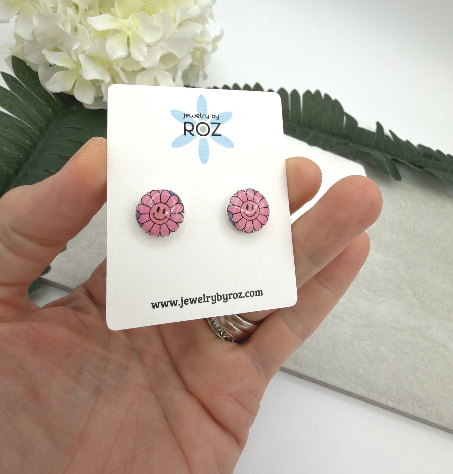 Stud Earrings Made with White Polymer Clay with Blue Smiley Face Flowers and Sterling Silver Posts PCE-1078