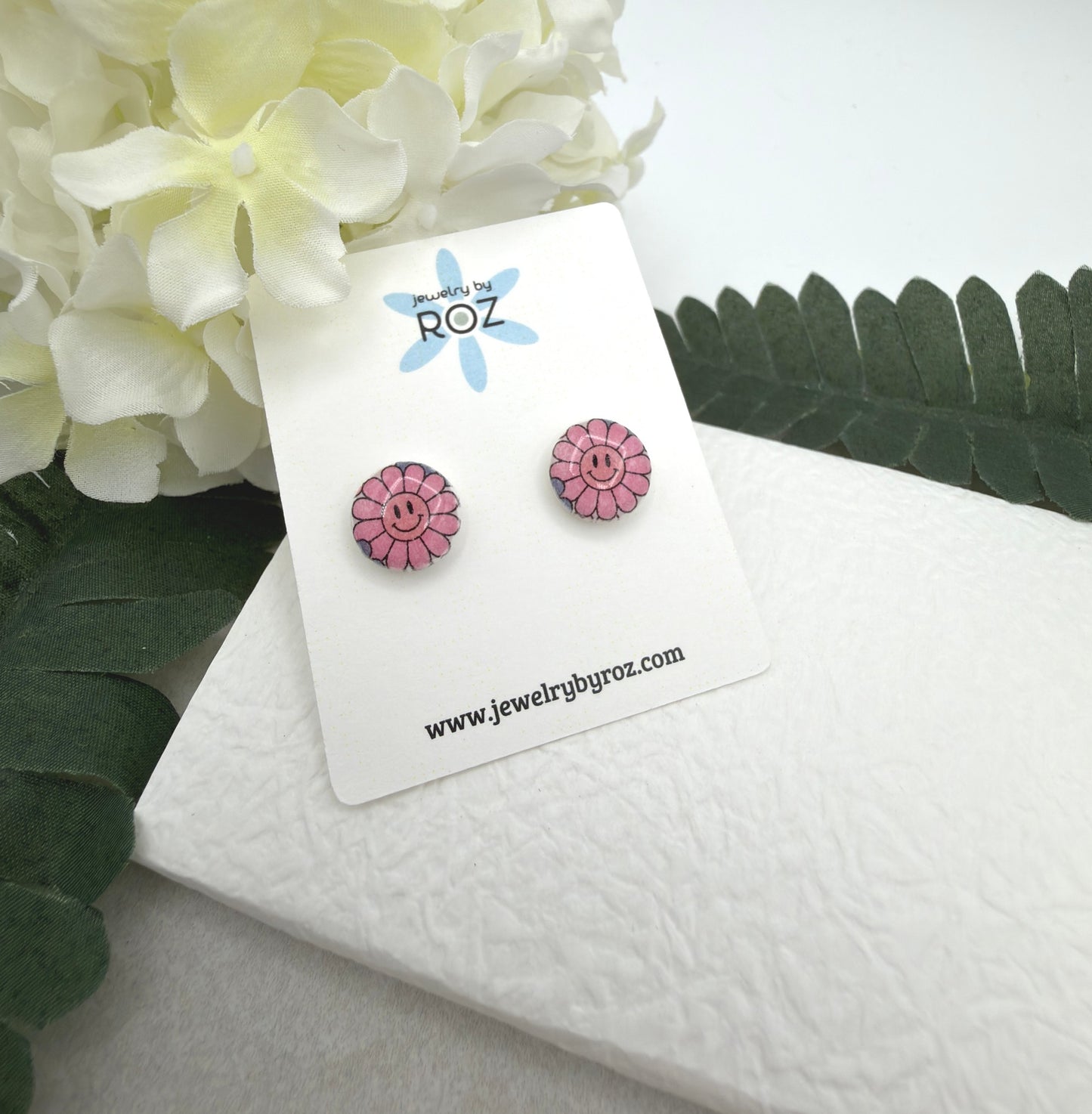 Stud Earrings Made with White Polymer Clay with Blue Smiley Face Flowers and Sterling Silver Posts PCE-1078