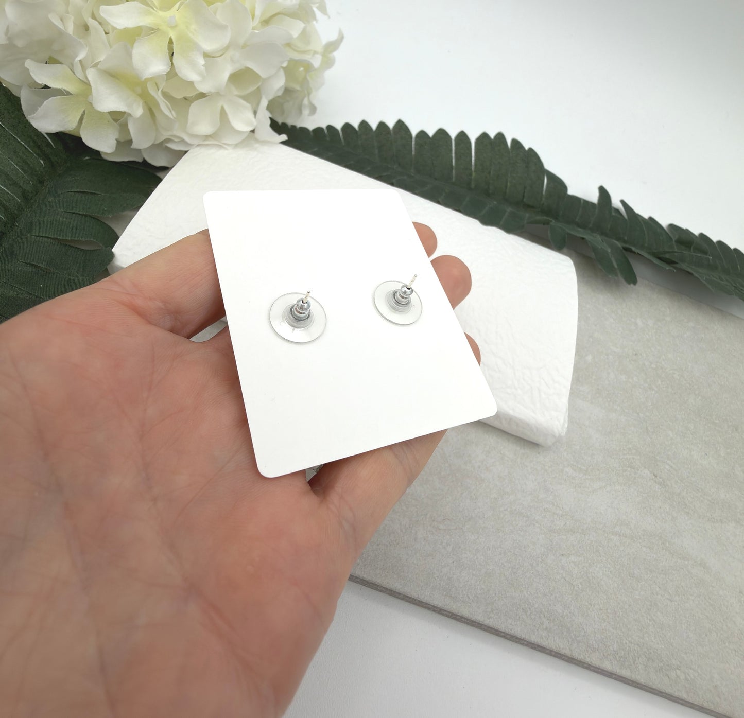 Stud Earrings Made with White Polymer Clay with Blue Smiley Face Flowers and Sterling Silver Posts PCE-1078
