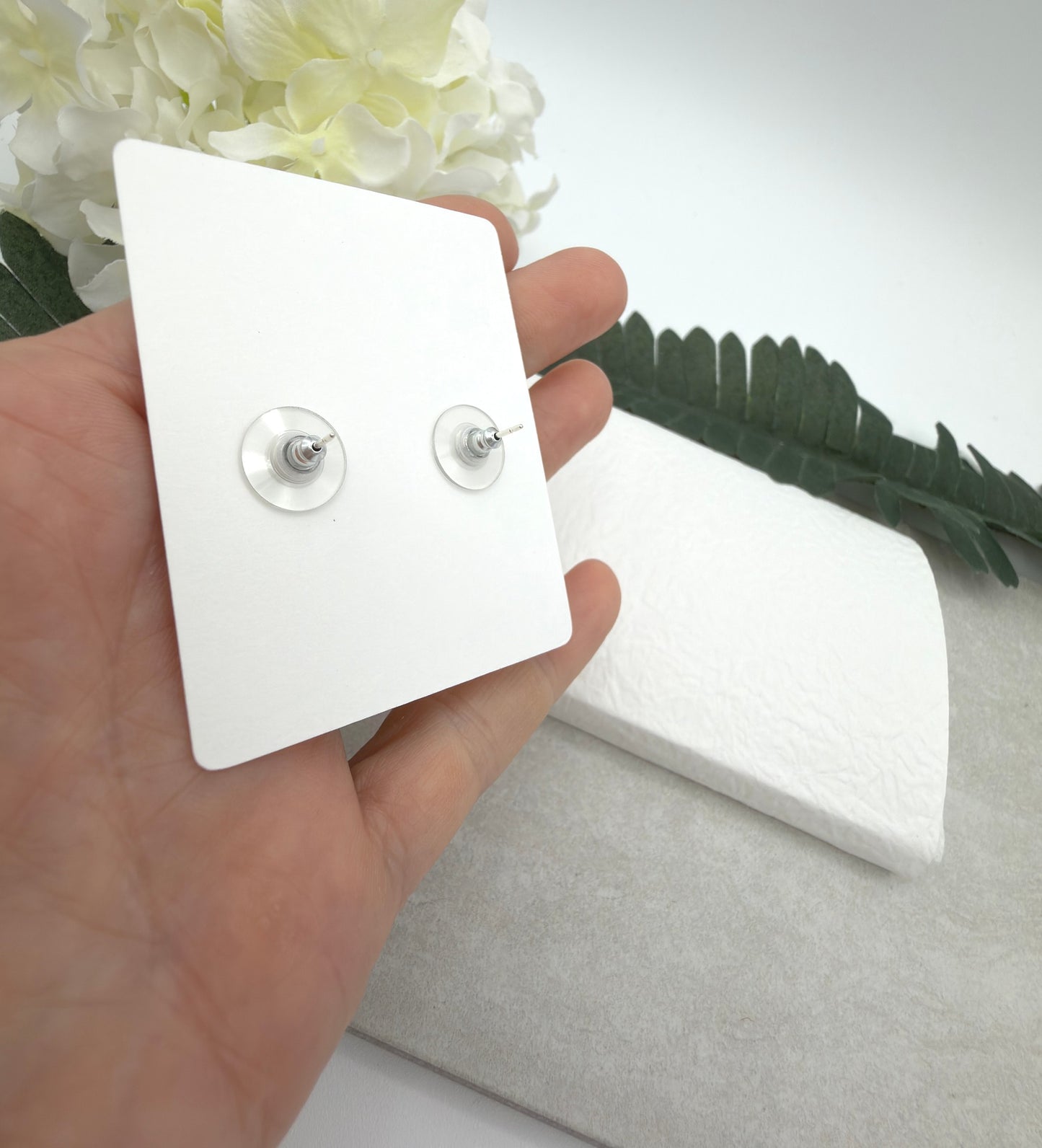 Stud Earrings Made with White Polymer Clay with pink Smiley Face Suns and Sterling Silver Posts PCE-1079