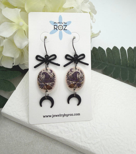 Earrings Made with Black Bow LInks and Polymer Clay Ovals with a Witch Hat Design and Oxidized Silver Earring Wires PCE-1085