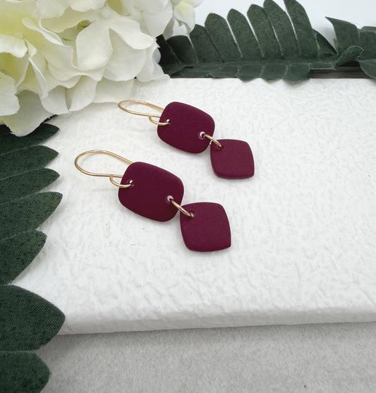 Earrings Made with a Deep Pink Polymer Clay Shaped into Rectangles and Squares PCE-947