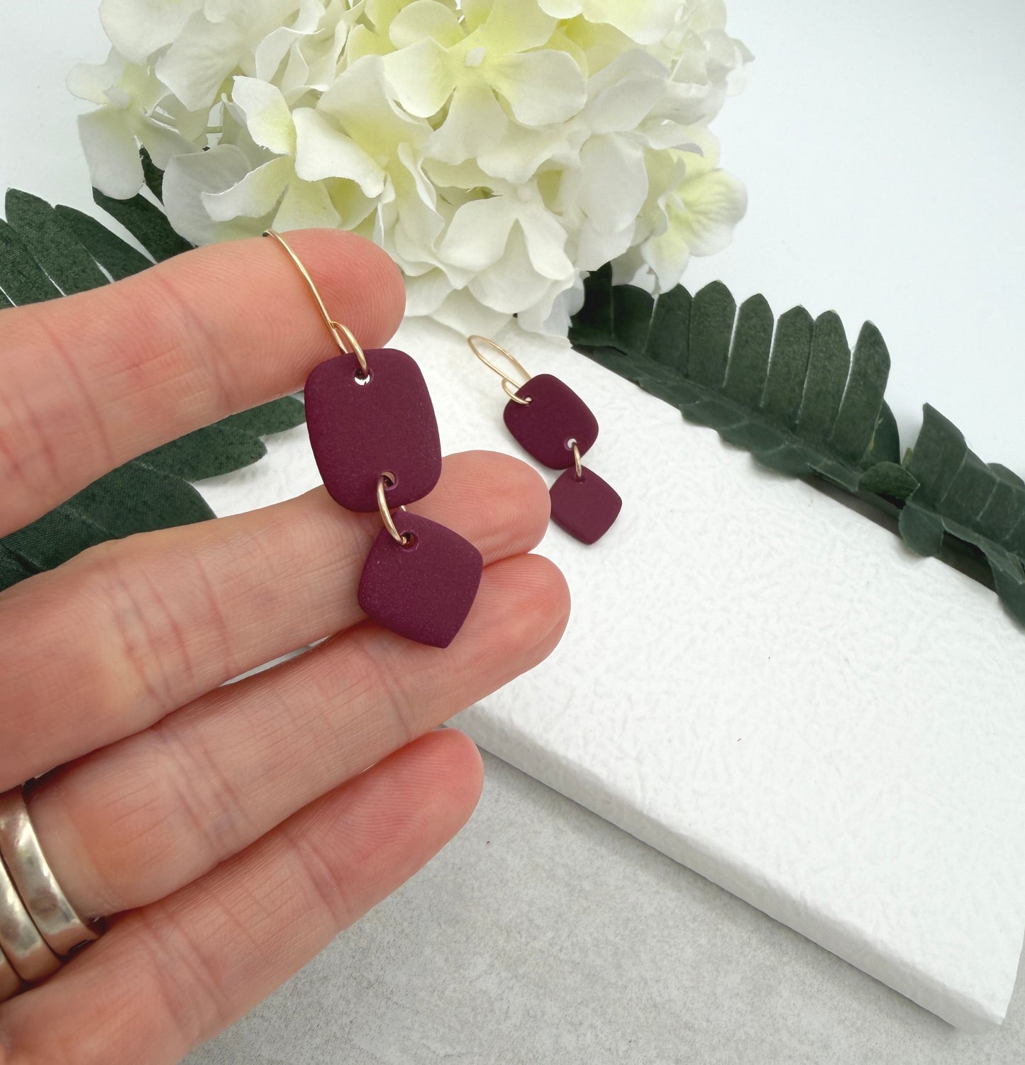 Earrings Made with a Deep Pink Polymer Clay Shaped into Rectangles and Squares PCE-947