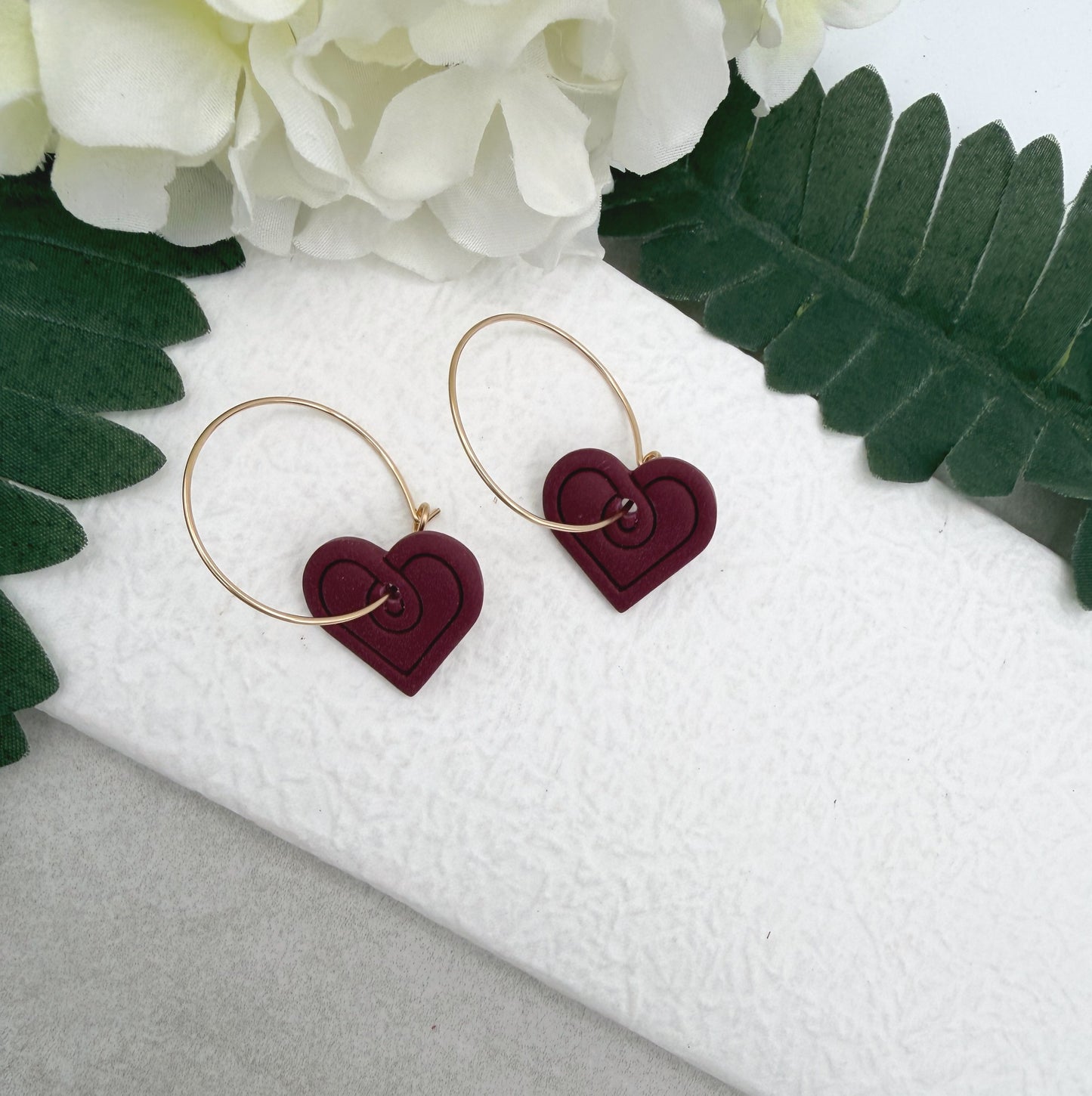 Earrings Made with a Deep Pink Polymer Clay Shaped into Hearts on Hoops PCE-948