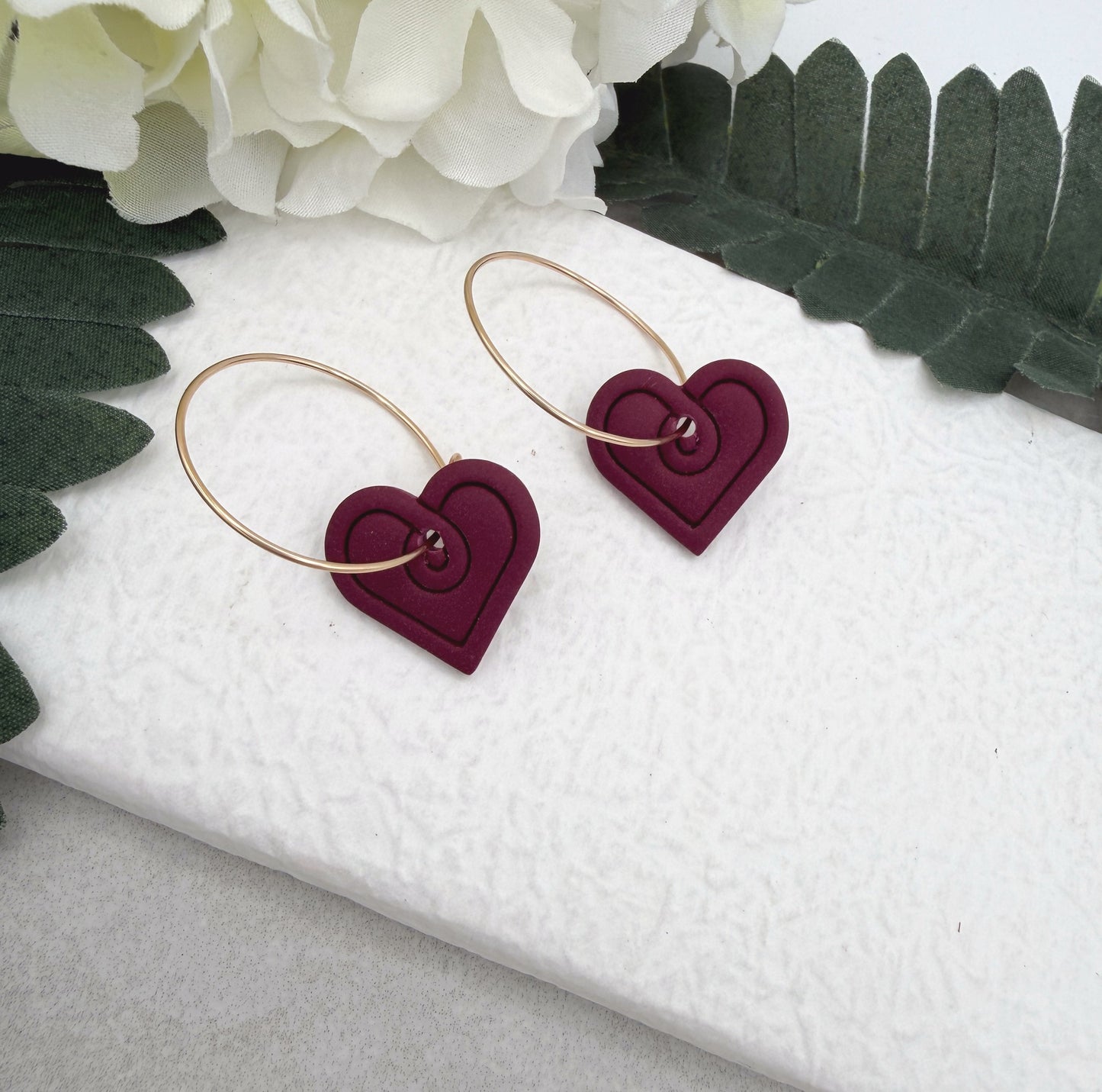 Earrings Made with a Deep Pink Polymer Clay Shaped into Hearts on Hoops PCE-948