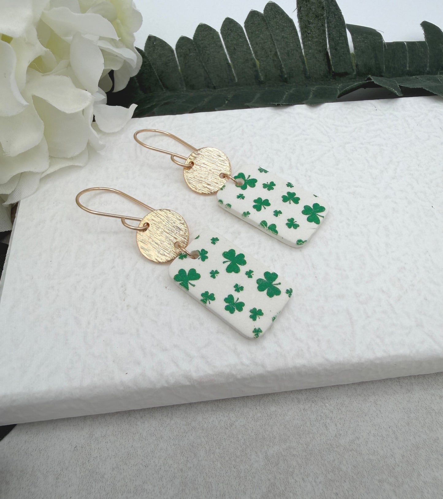 Earrings Made with White Polymer Clay Rectangles with a Green Clover Design and Gold Plated Circles - PCE-967