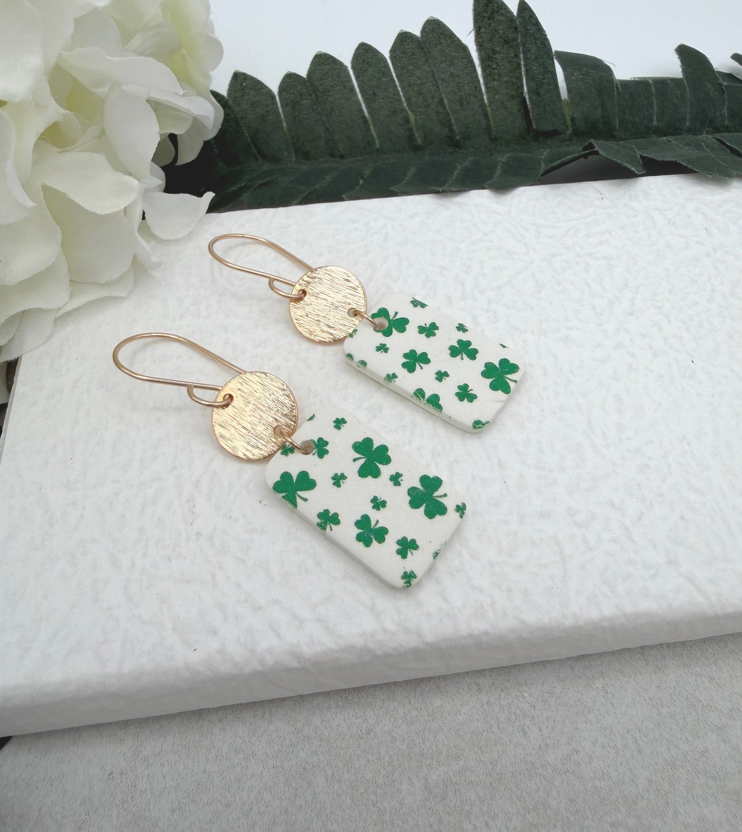 Earrings Made with White Polymer Clay Rectangles with a Green Clover Design and Gold Plated Circles - PCE-967