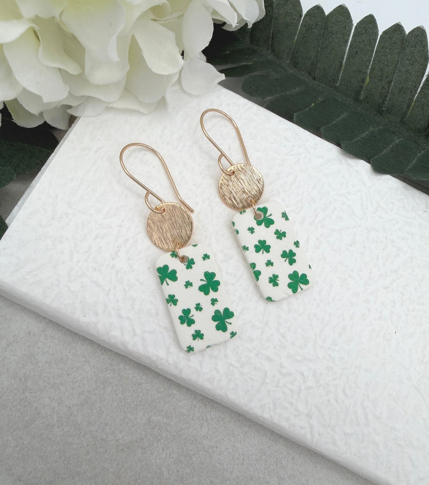 Earrings Made with White Polymer Clay Rectangles with a Green Clover Design and Gold Plated Circles - PCE-967