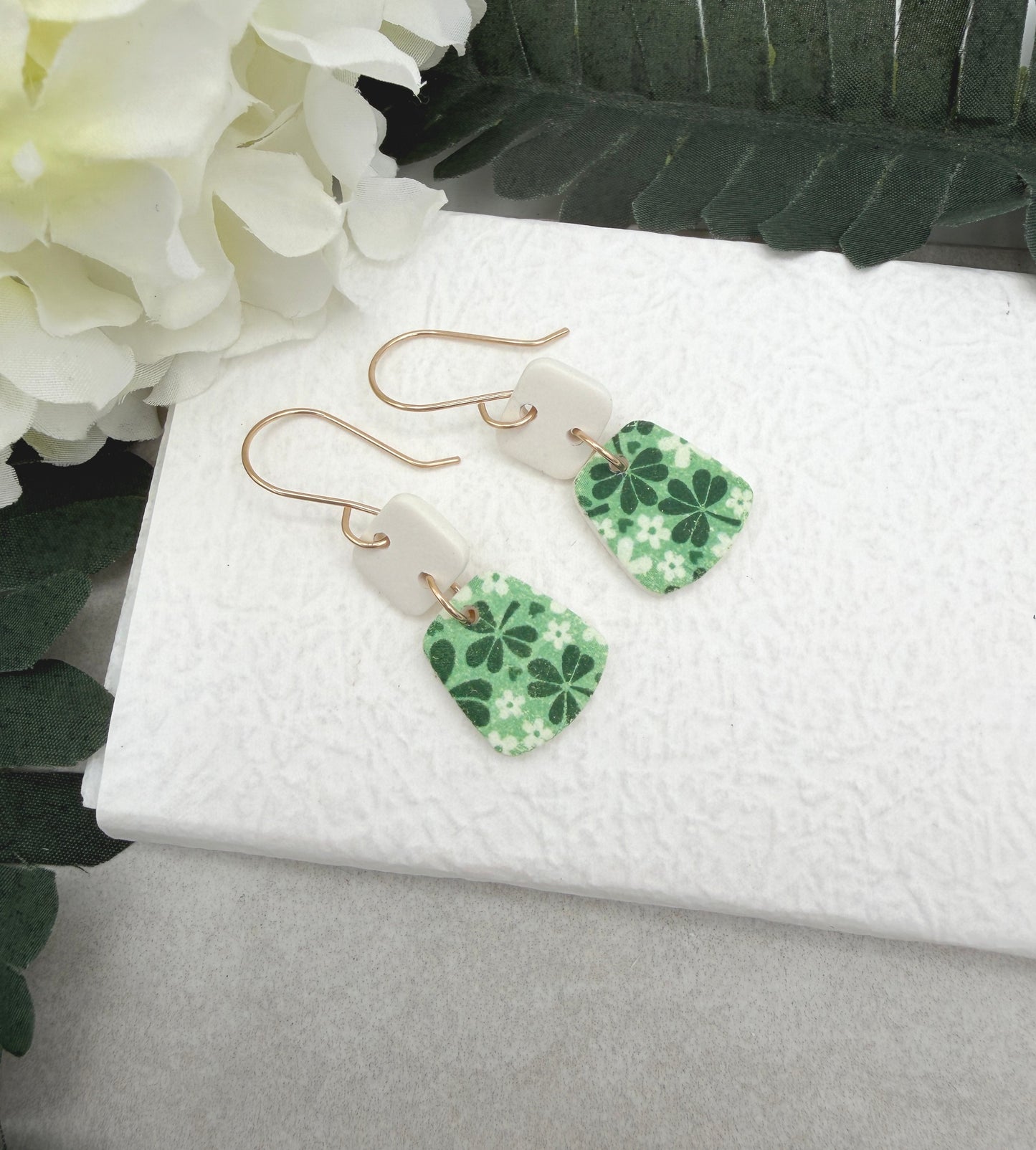 Earrings Made with White Polymer Clay Squares and Trapezoids with a Green Clover Design - PCE-969