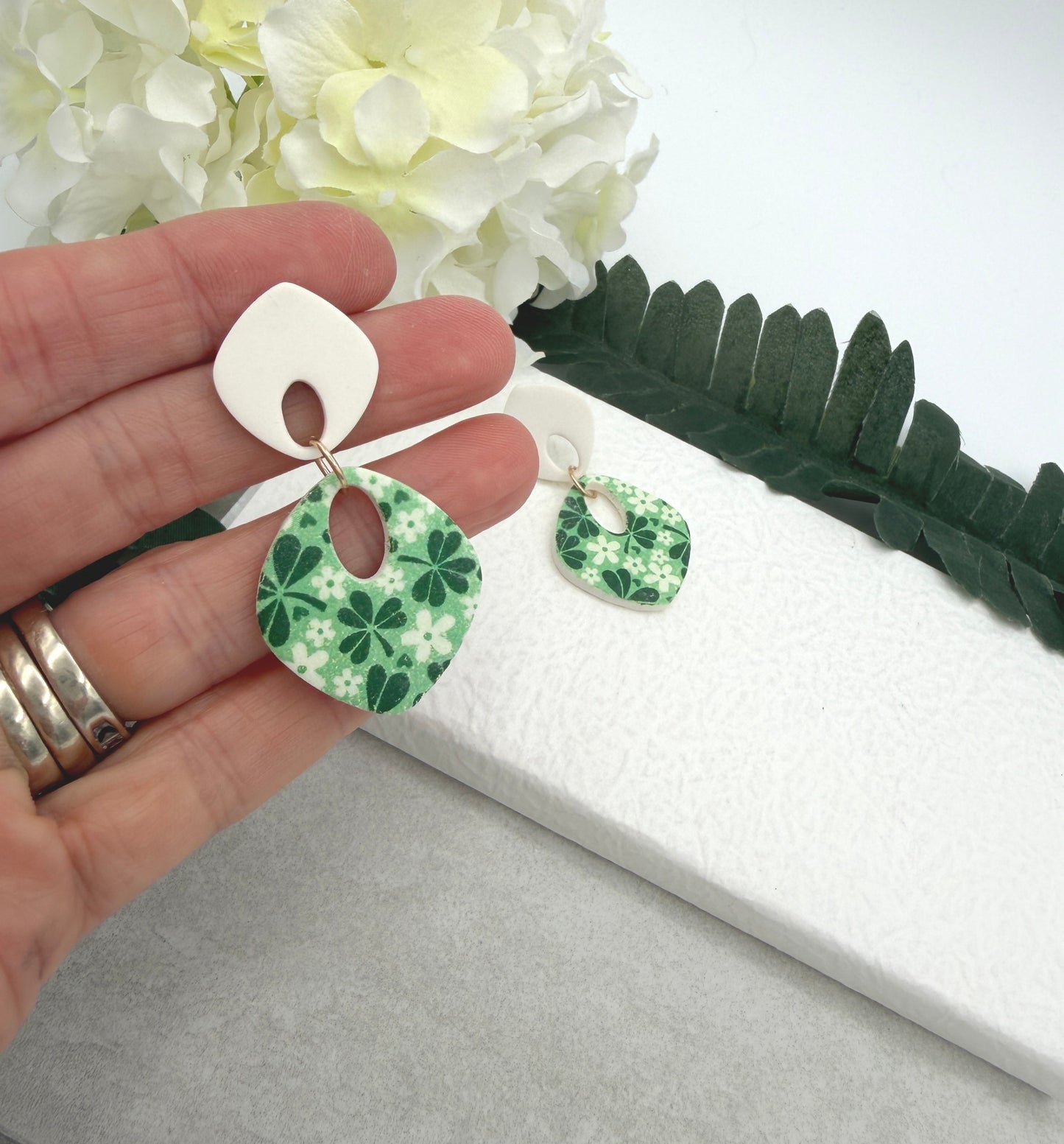 Earrings Made with White Polymer Clay teardrops with a Green Clover Design - PCE-970