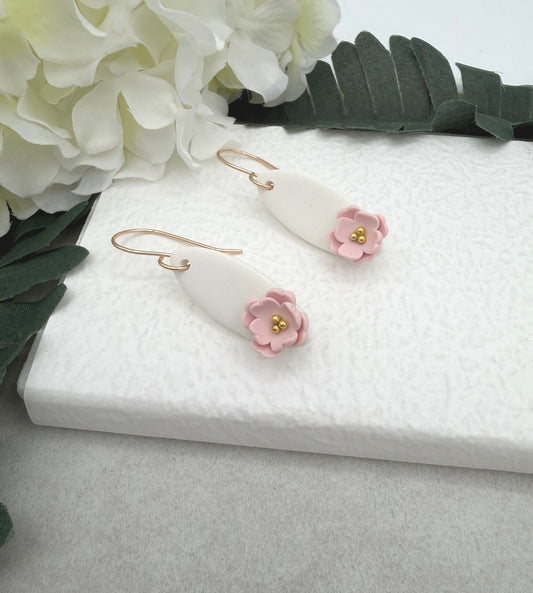 Earrings Made with White Polymer Clay Ovals and Pink Flowers - PCE-986