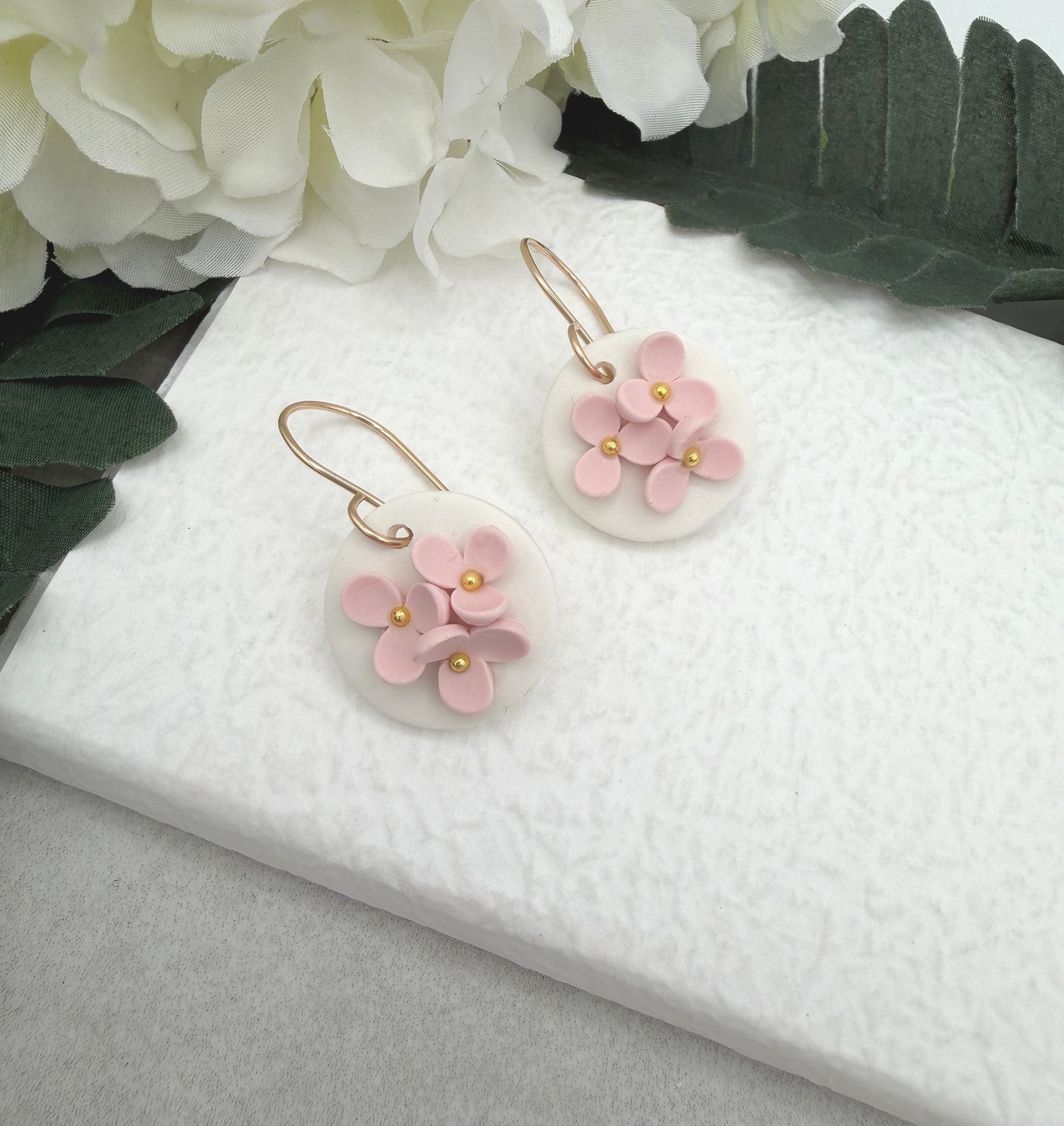 Earrings Made with White Polymer Clay Circles and Pink Flowers - PCE-987