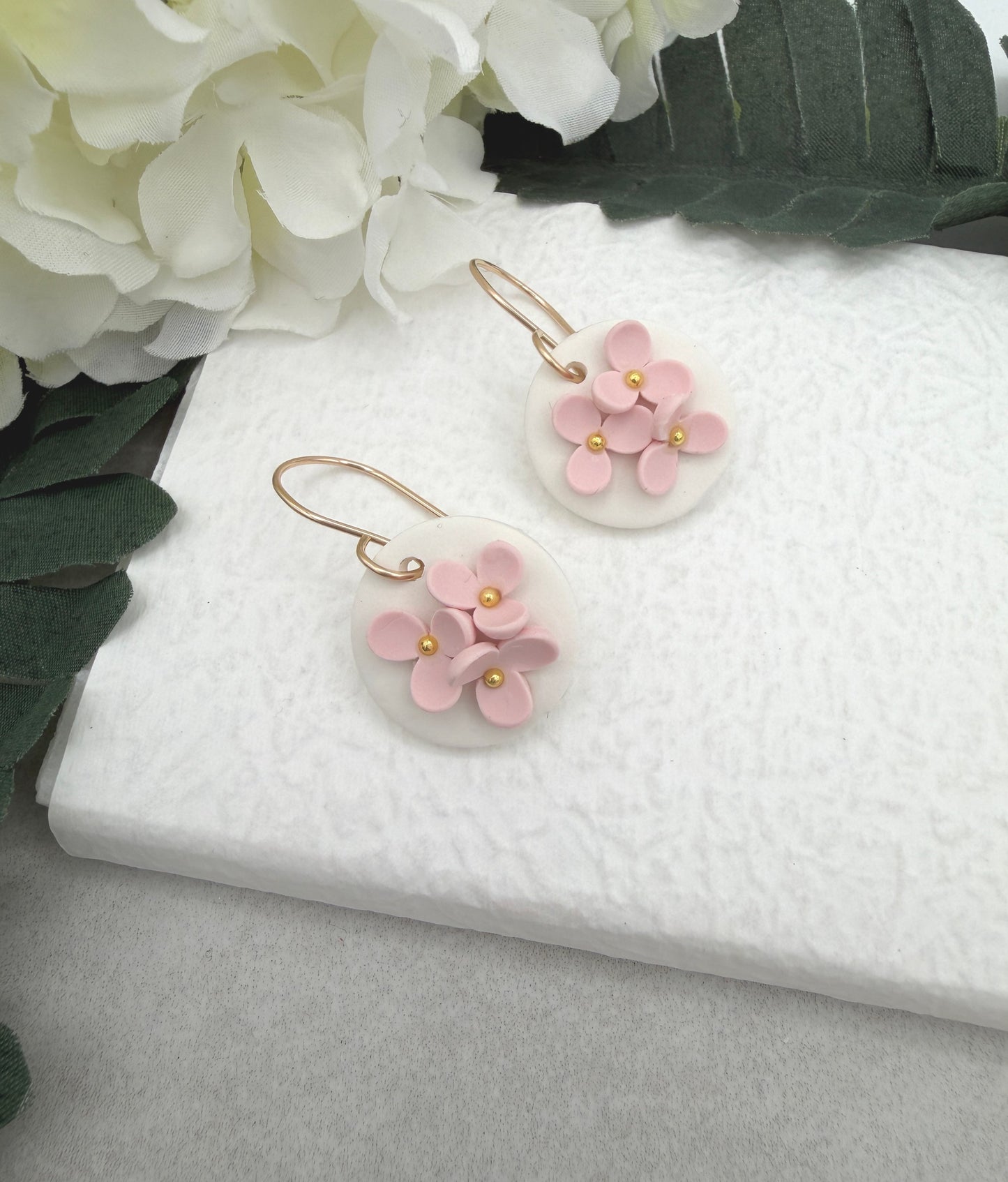 Earrings Made with White Polymer Clay Circles and Pink Flowers - PCE-987