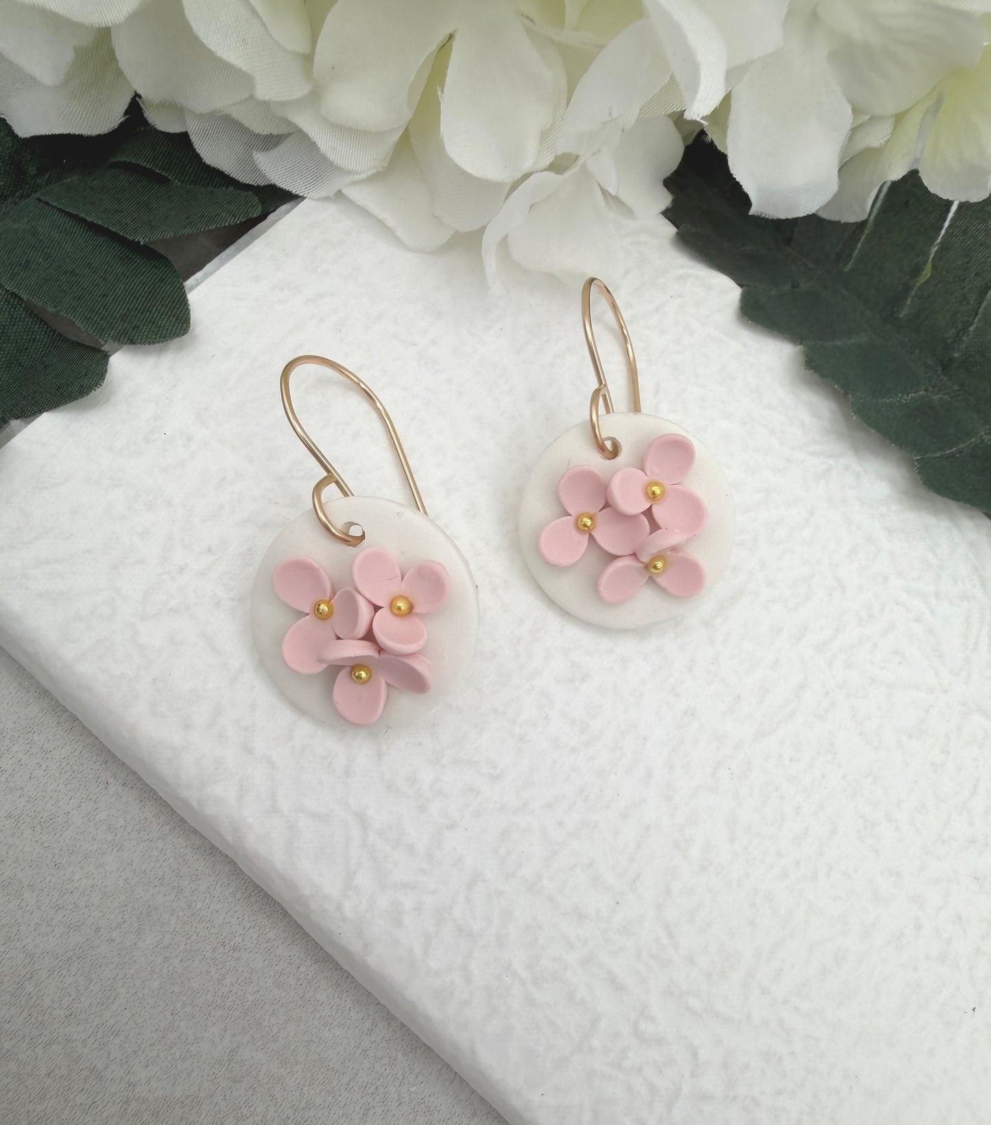 Earrings Made with White Polymer Clay Circles and Pink Flowers - PCE-987