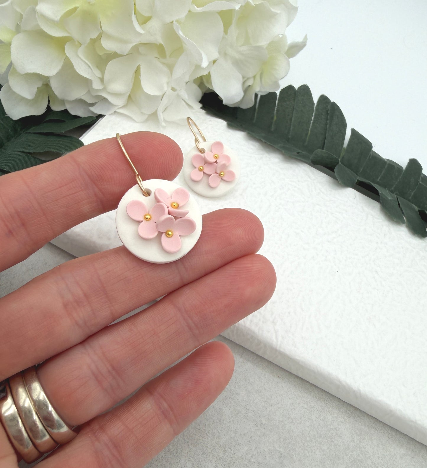 Earrings Made with White Polymer Clay Circles and Pink Flowers - PCE-987