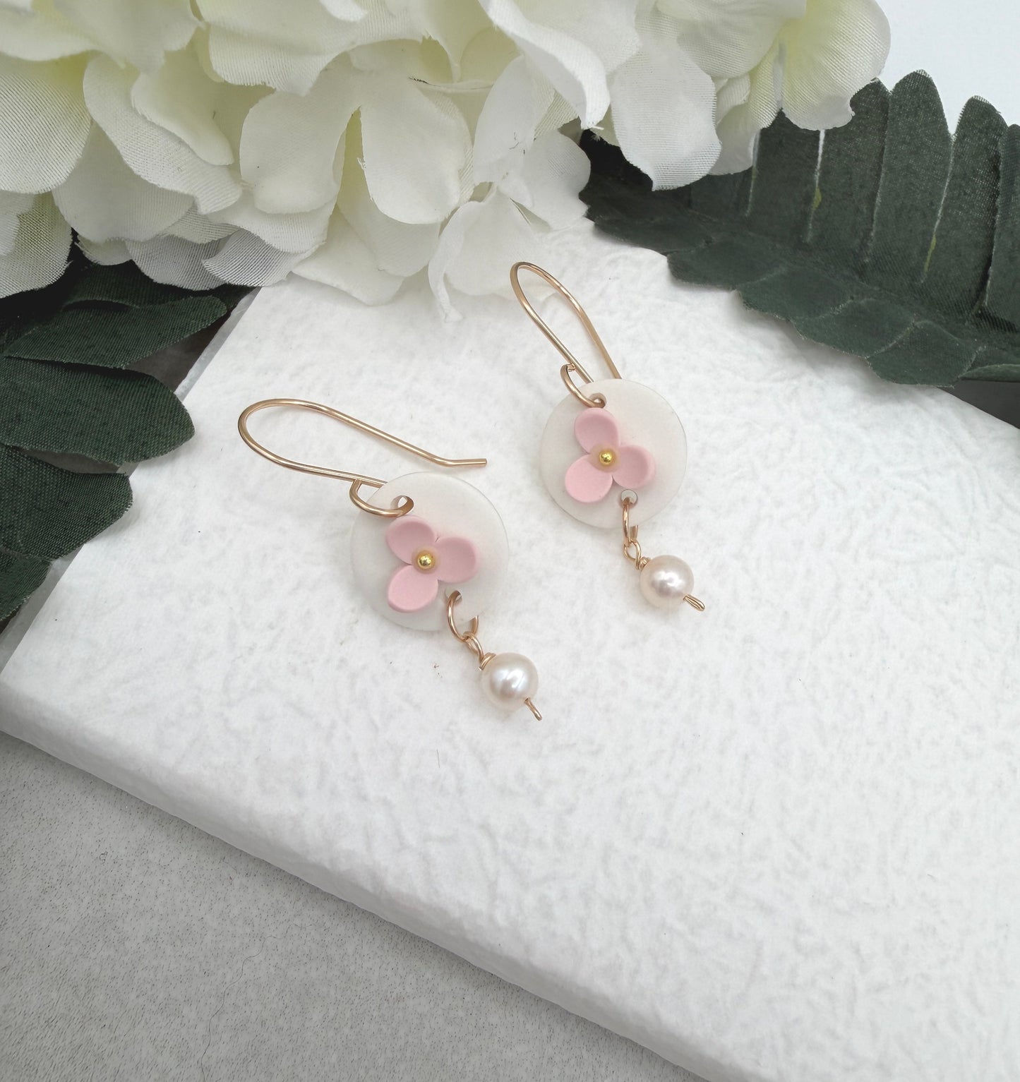 Earrings Made with White Polymer Clay Circles with Pink Flowers and Pearl Drops - PCE-988