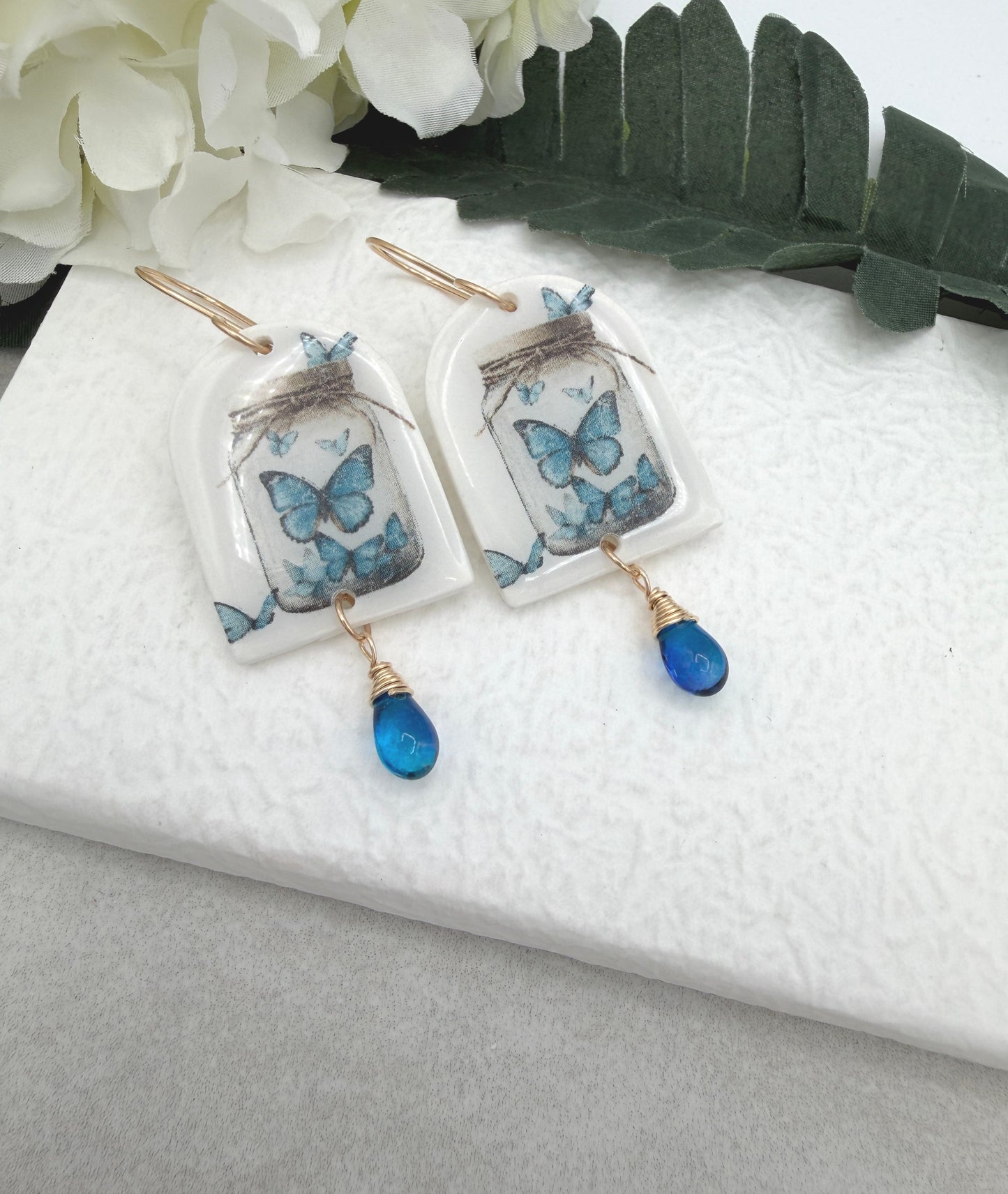 Earrings Made with Polymer Clay Arches with Butterflies and Blue Glass Teardrops PCE-991