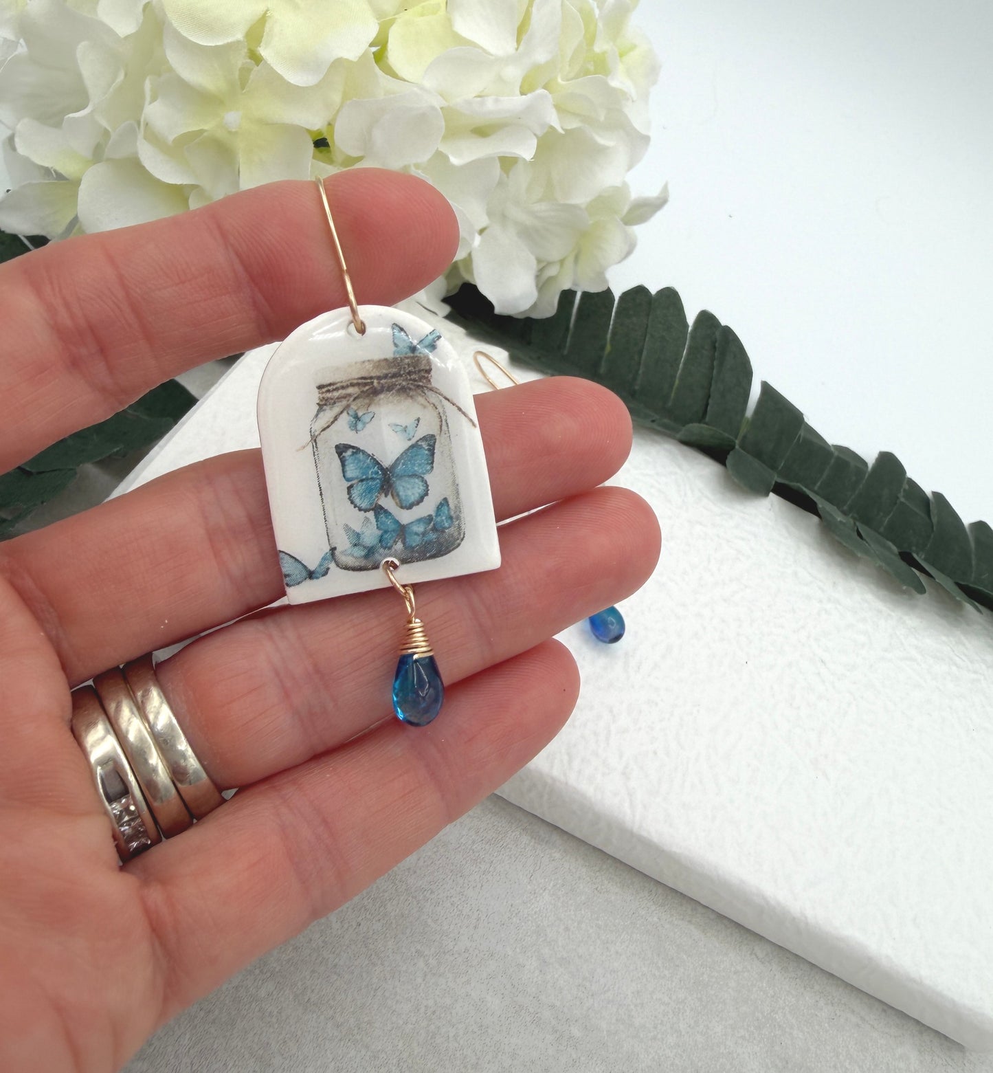Earrings Made with Polymer Clay Arches with Butterflies and Blue Glass Teardrops PCE-991