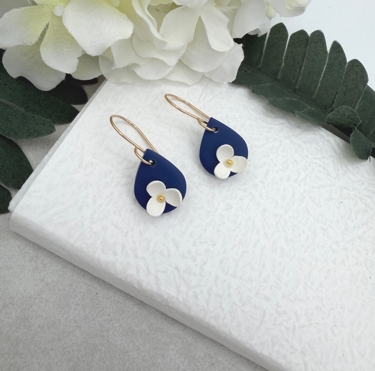 Earrings Made with Navy Polymer Clay Teardrops and White Flowers - PCE-993