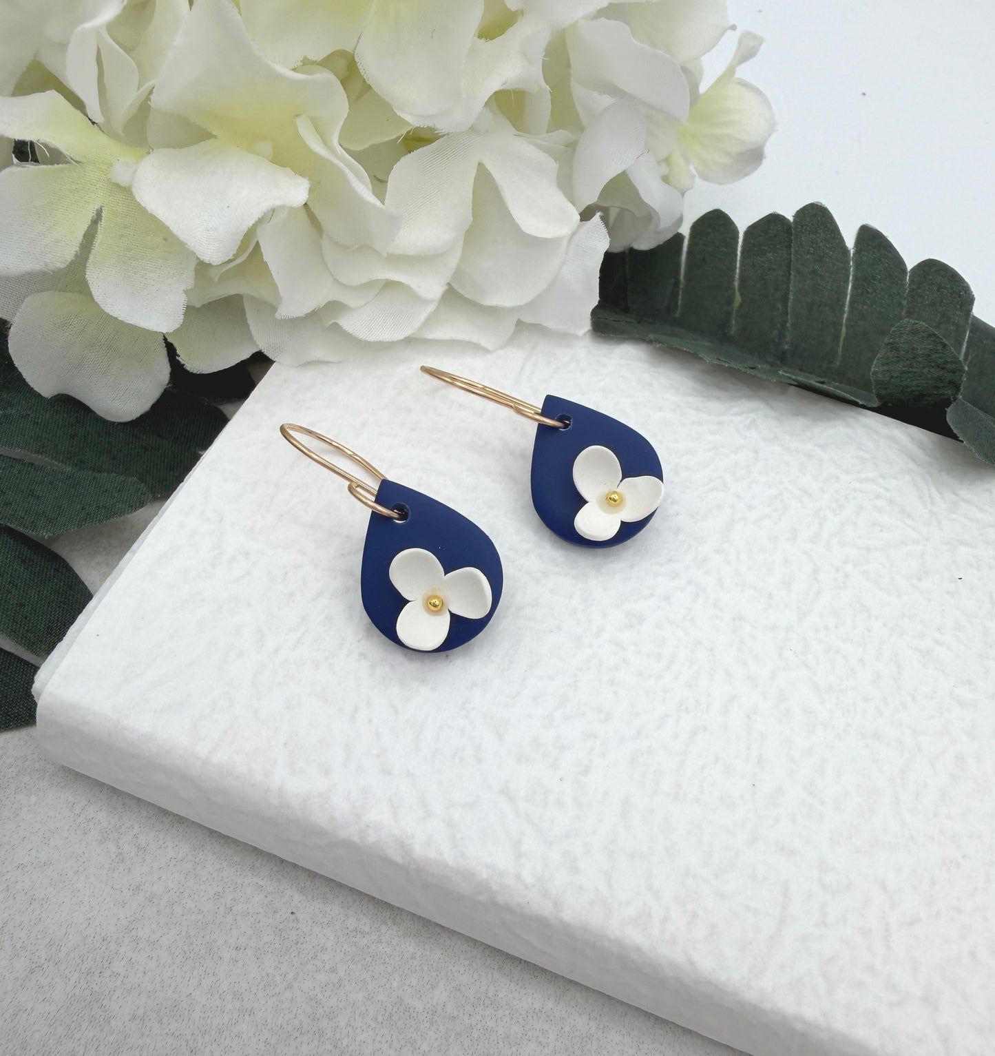 Earrings Made with Navy Polymer Clay Teardrops and White Flowers - PCE-993