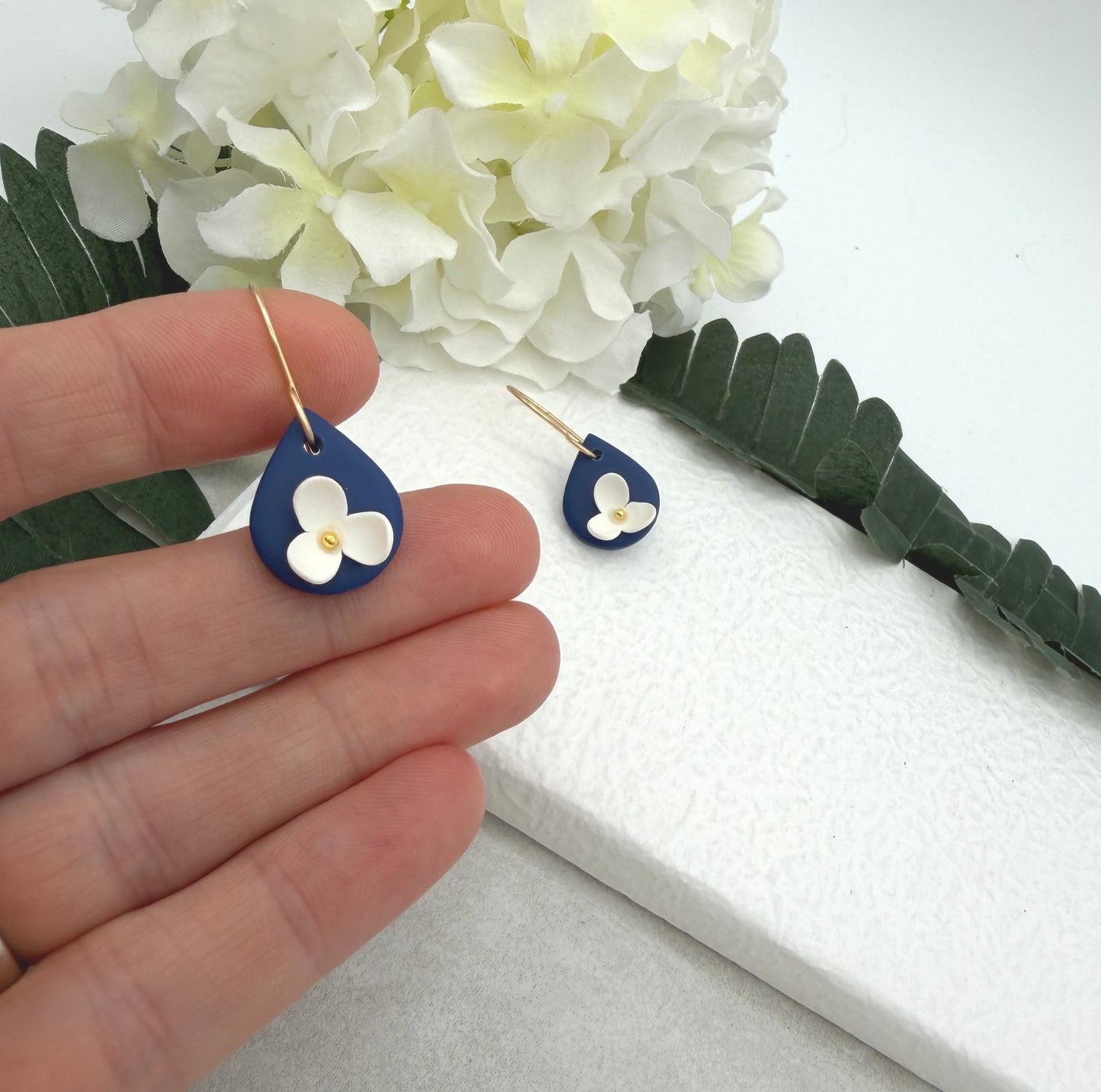 Earrings Made with Navy Polymer Clay Teardrops and White Flowers - PCE-993