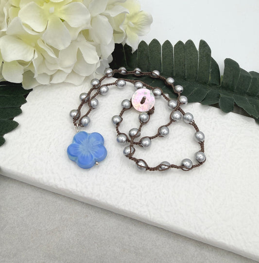 Crocheted Necklace with a Brown Cord, Silver Glass Beads and a Large, Blue Czech Glass Flower SN-678