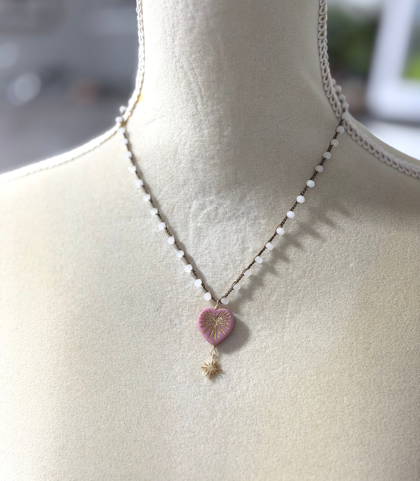 Crocheted Necklace with a Brown Cord, White Crystal Beads, a Pink Starburst Heart and Gold Star SN-681