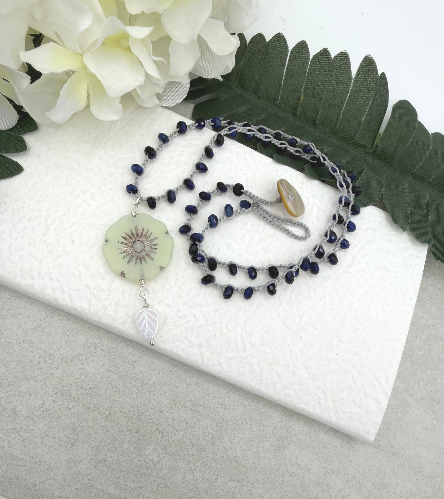 Crocheted Necklace with a Light Gray Cord, Blue Tiger's Eye Beads and a Large, Lime Green Czech Glass Flower SN-682