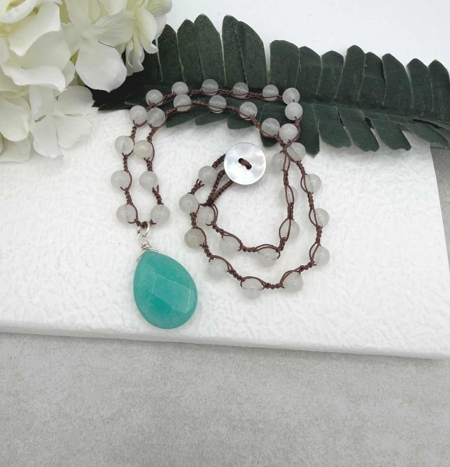 Crocheted Necklace with a Brown Cord, White Jade Beads and a Large, Aqua Jade Teardrop SN-686