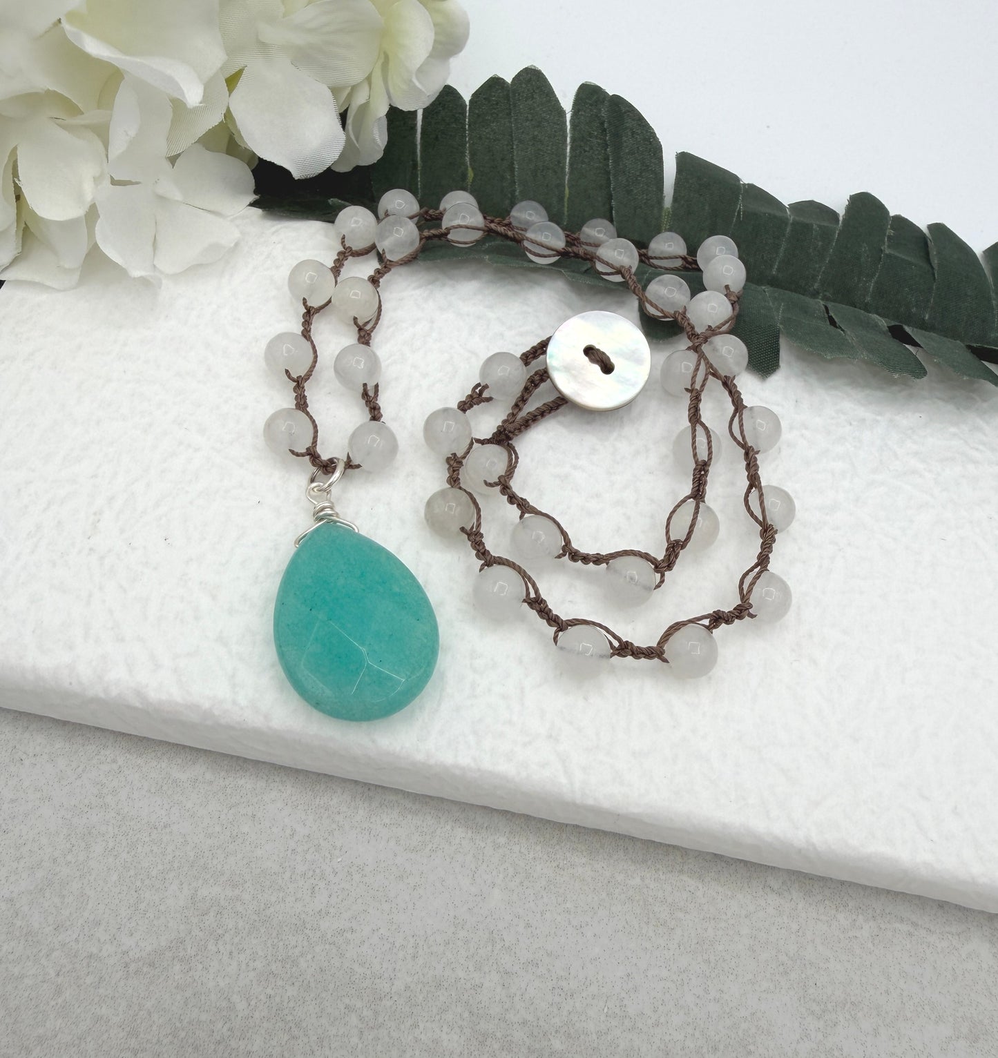 Crocheted Necklace with a Brown Cord, White Jade Beads and a Large, Aqua Jade Teardrop SN-686