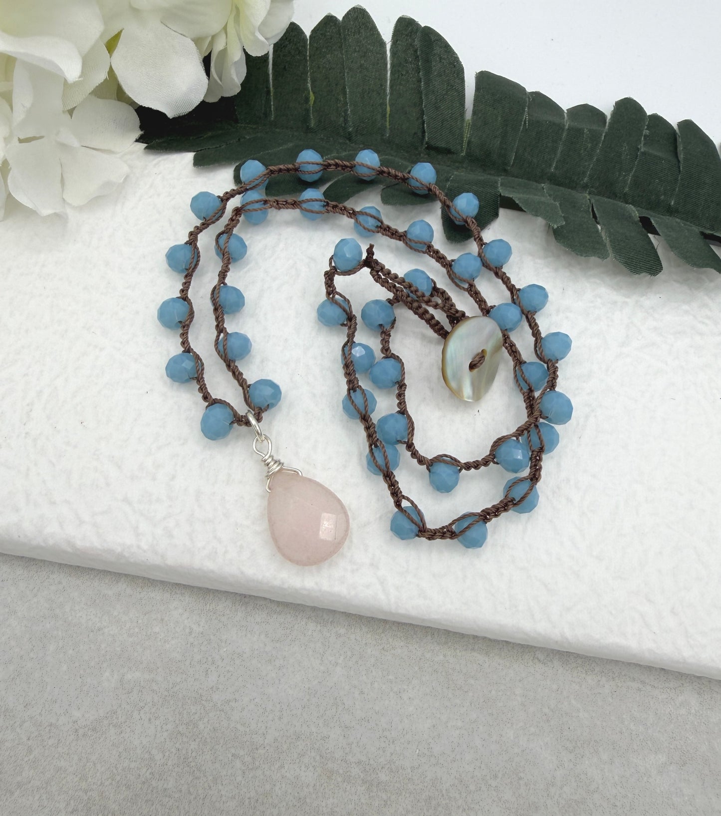 Crocheted Necklace with a Brown Cord, Blue Crystal Beads and a Pale Pink Jade Teardrop SN-687
