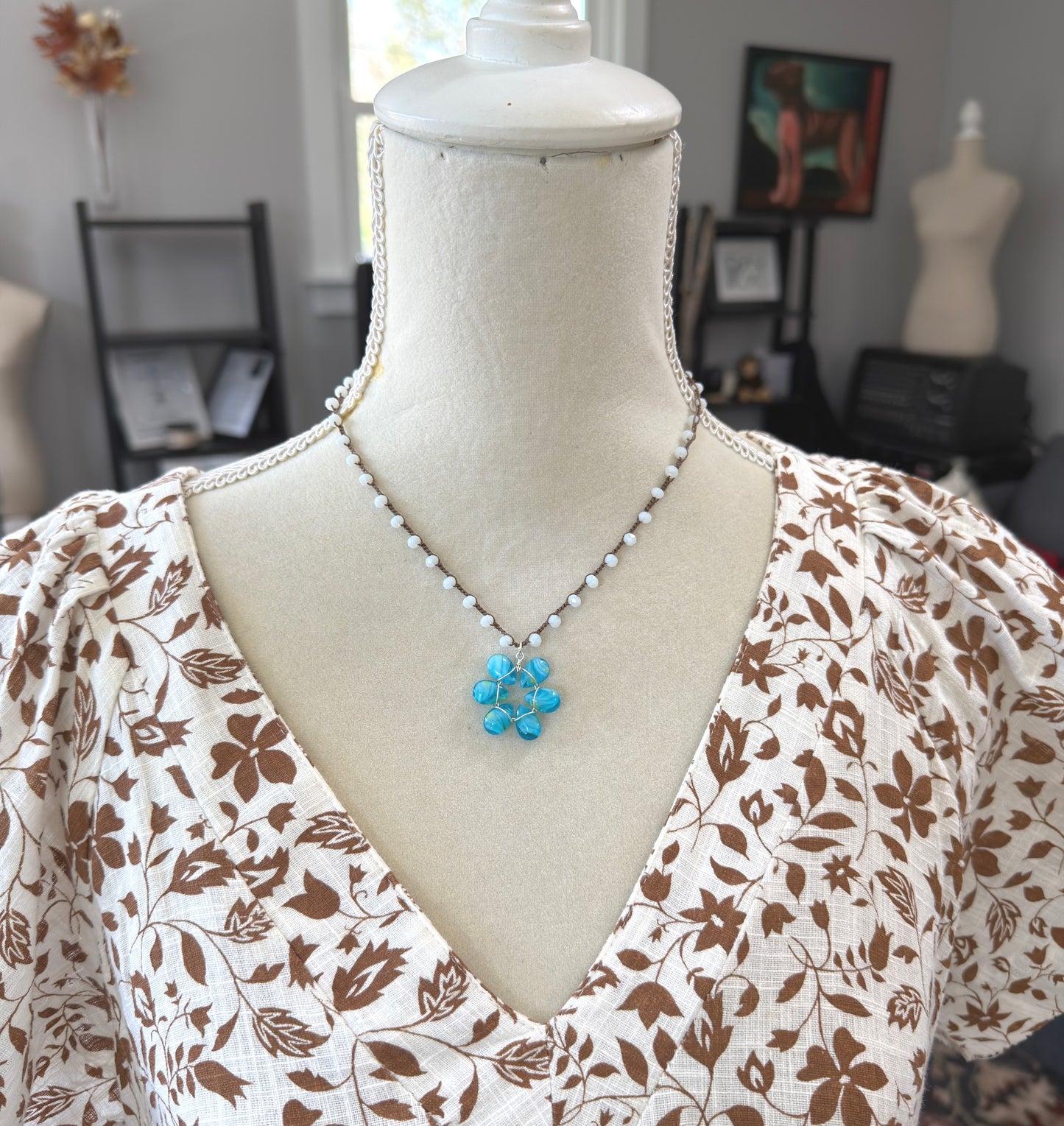 Crocheted Necklace with a Brown Cord, White Crystals and a Blue and Yellow Glass Teardrop Flower SN-688