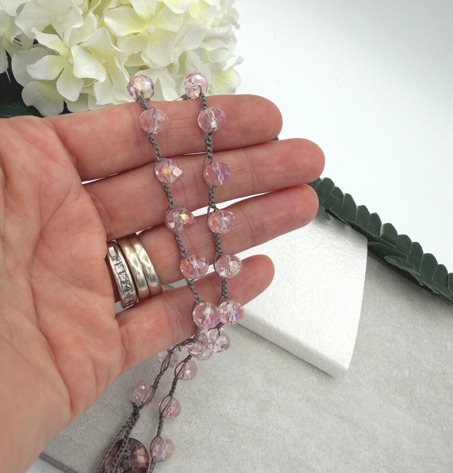 Crocheted Necklace with a Greige Cord and Pink Crystal Beads SN-693