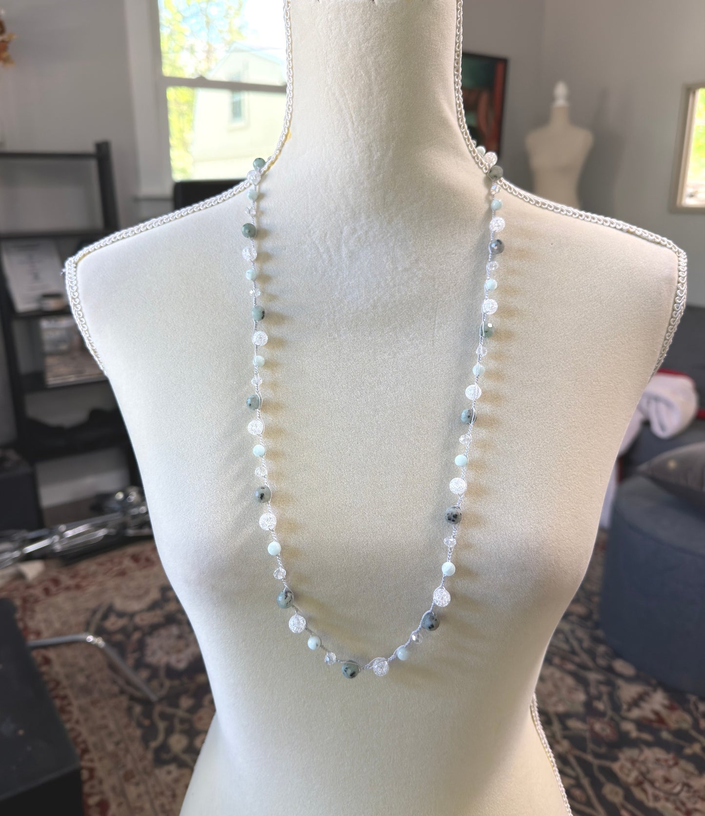A Long Crocheted Necklace with a Light Gray Cord With Agate, Crackled Quartz and Crystal Beads SN-694