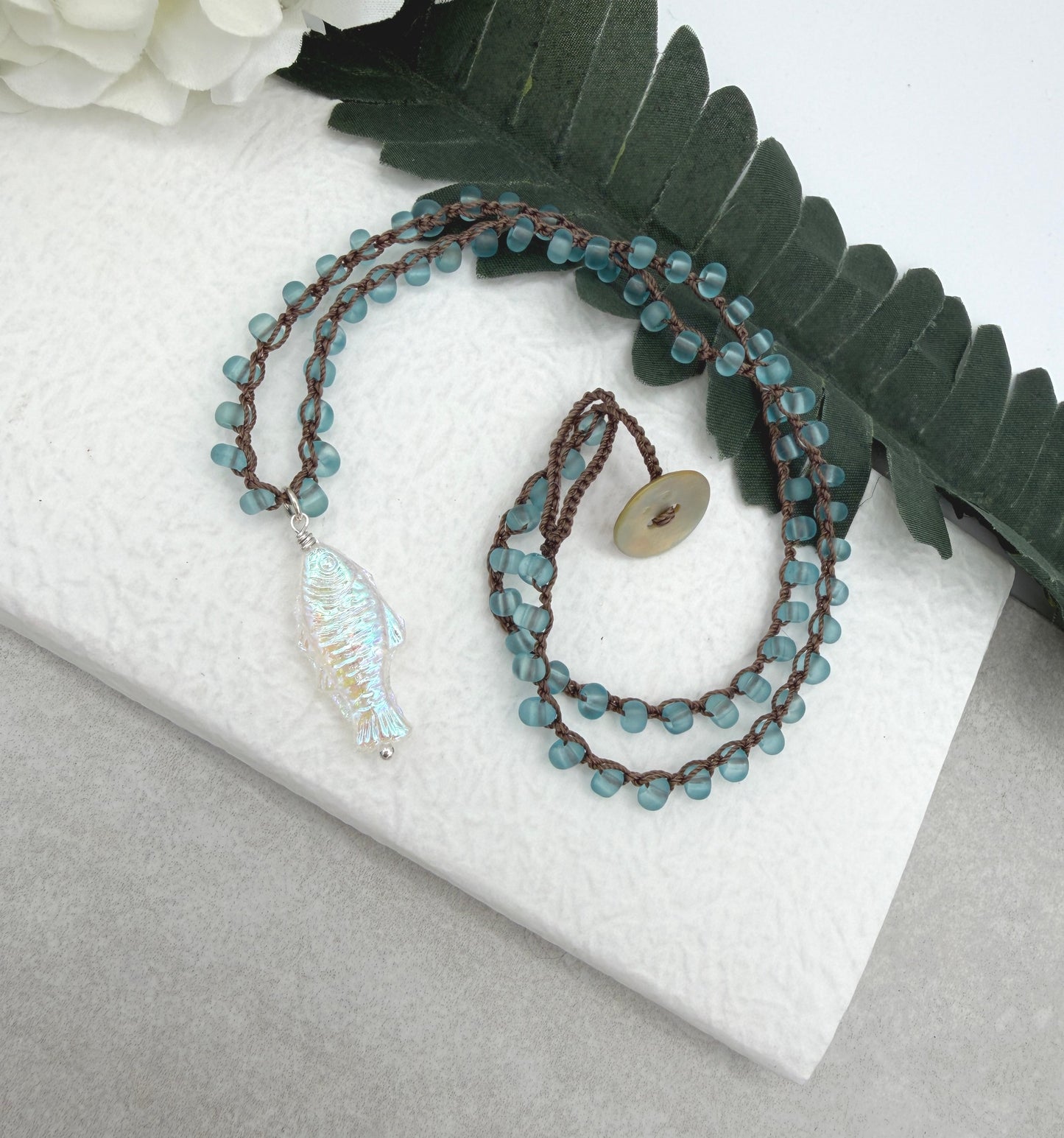 Crocheted Necklace with a Brown Cord, Blue Frosted Glass Beads and a Clear AB Glass Fish Bead Pendant SN-696