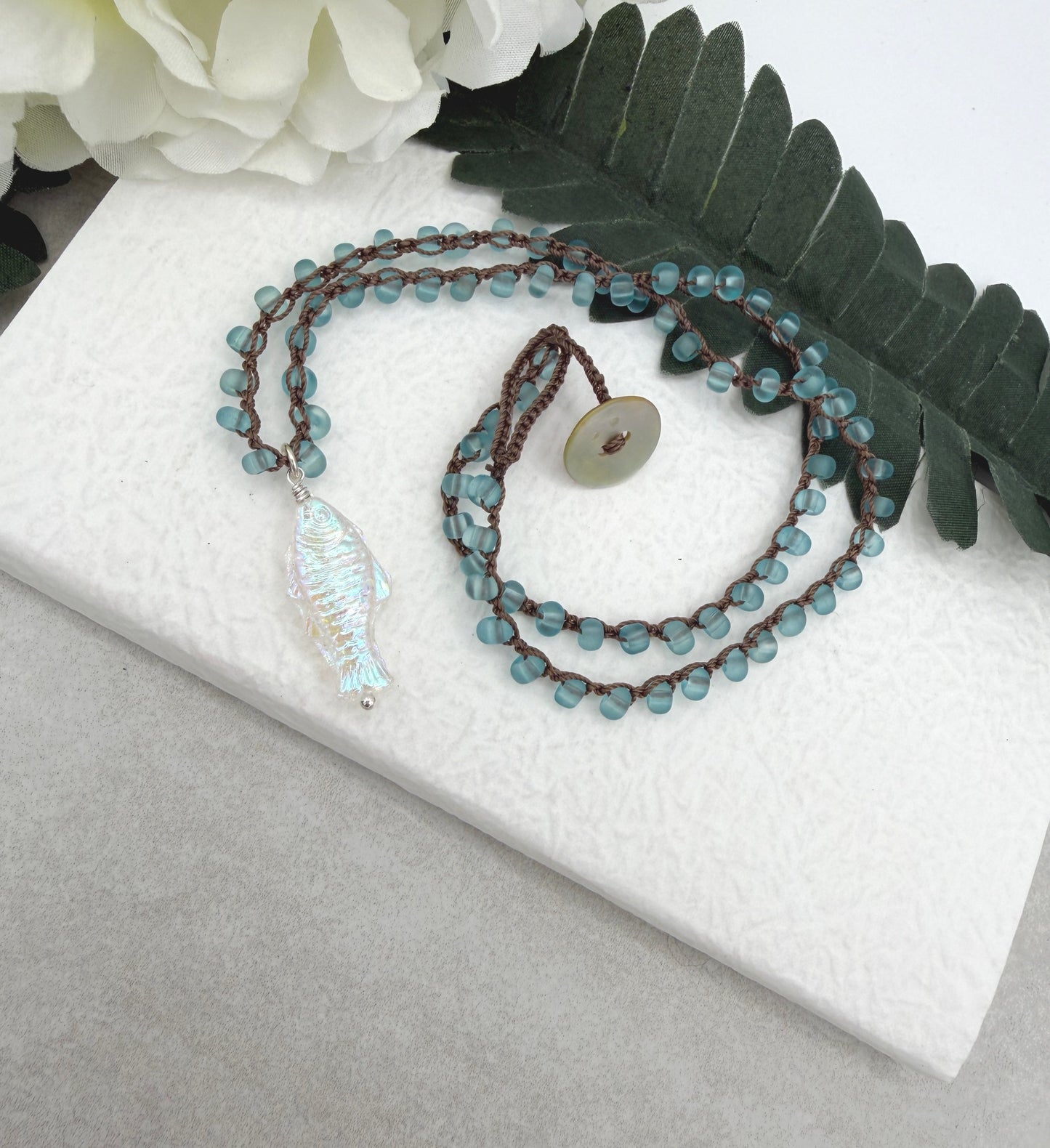 Crocheted Necklace with a Brown Cord, Blue Frosted Glass Beads and a Clear AB Glass Fish Bead Pendant SN-696