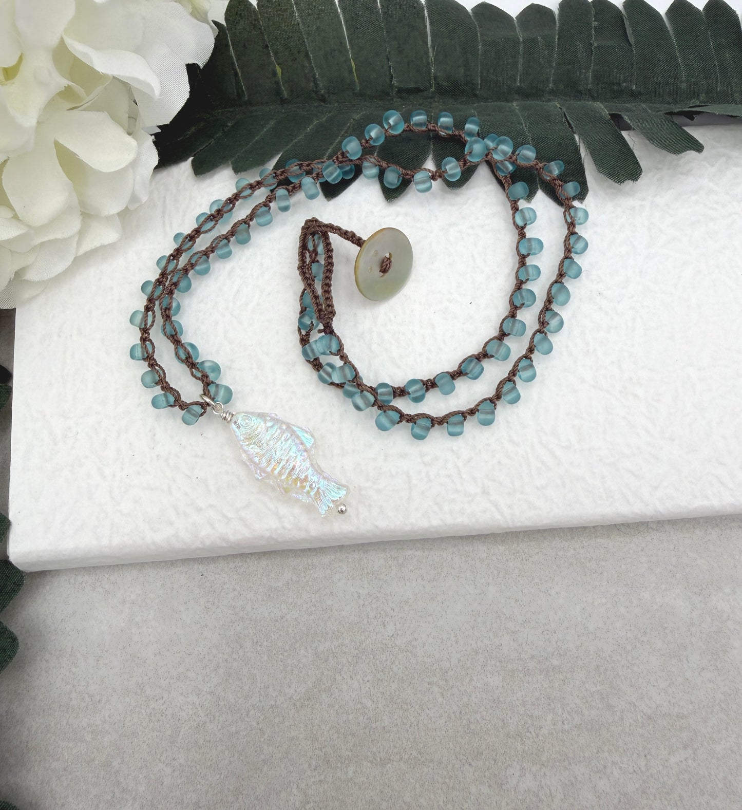 Crocheted Necklace with a Brown Cord, Blue Frosted Glass Beads and a Clear AB Glass Fish Bead Pendant SN-696