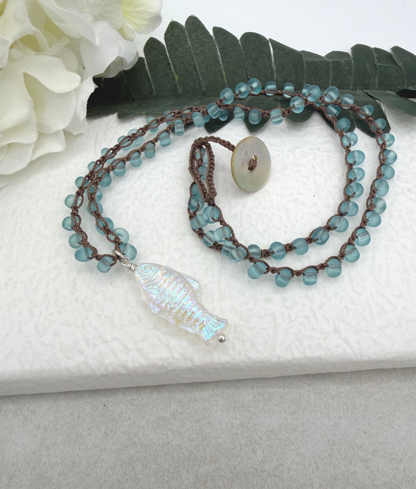 Crocheted Necklace with a Brown Cord, Blue Frosted Glass Beads and a Clear AB Glass Fish Bead Pendant SN-696