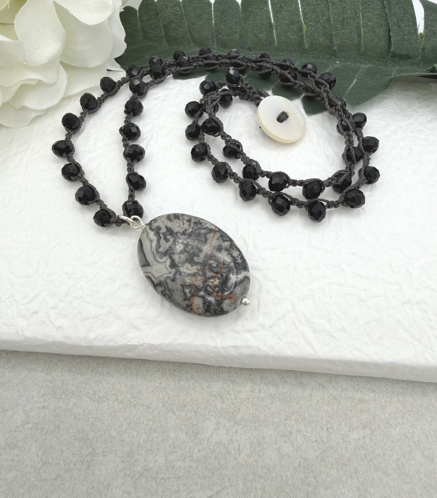 Crocheted Necklace with a Dark Gray Cord, Black Crystal Beads and a Silver Leopard Jasper Pendant SN-703