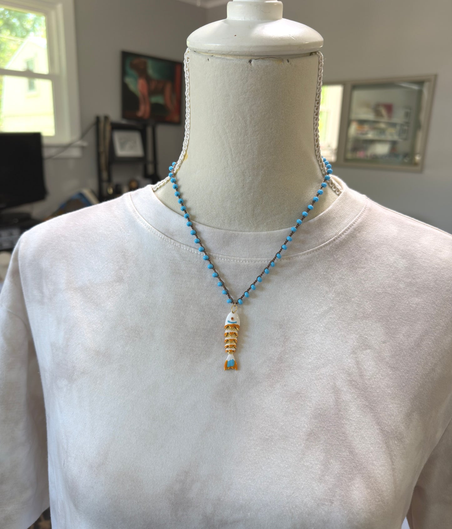 Crocheted Necklace with a Brown Cord, Turquoise Glass Beads and a White, Orangle Enameled Fish Charm SN-705